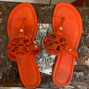 Tory Burch orange leather sandals